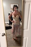 Very cute and very flattering. I liked it more than I expected. I just didn't think it was beachy enough for my taste since it's for vacation beach pictures. Someone has to help lace you in it too. That's another reason I decided not to keep it. Not user friendly if no one else is handy while you're getting dressed. - Nancy W.