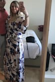 This was my first Lulus purchase and I was quite skeptical, especially because I'm tall and maxi dresses are never long on me. But this dress was perfection. The dress hit the floor with flats on! The cutouts were perfect. The material perfect for most occasions..this was for a beach wedding in Mexico. The dress was a little loose but not enough to make me want to size up. It was comfortable and made me feel like a million bucks - Agnieszka C.