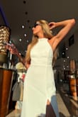 We had a white-themed pre-wedding party to attend, and I chose this dress. It runs large and long, so I would get a size smaller and with enough time to hem it. Otherwise, it was beautiful on my body, and I didn't have any issues with it being see-through like some of the previous reviews said. Love it! - Lauren K.