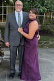I absolutely loved this dress! I wore this to my best friend's Navy Retirement Ceremony, but it had a wedding vibe. 

The purple satin color was perfect, rich, elegant, and exactly what I wanted. The asymmetrical cut gave it a slightly edgy feel while still being classy and subtly sexy.

It is very long; I'm 5'3" and needed 4" heels, but it made the dress feel extra glamorous. The fit was flattering and the fabric draped beautifully.

The only minor issue was that the covered buttons in the back were a bit tricky to fasten. Otherwise, it was stunning, and I received so many compliments! - Christina P.
