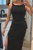 Comfortable, stretchy fit. The back is unique and sexy. I like the mix of conservative (neckline) and sexy (slit and open back). - Maggie S.