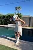 I am OBSESSED with this dress! Felt like a disco rodeo queen at my Scottsdale bachelorette party. It's comfy, well made, and not see-through. I read some reviews saying they had issues with the zipper or the dress being uneven at the bottom but I did not have either of those issues. 10/10 would recommend! - Katie H.