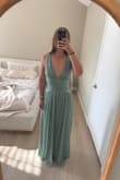 Fabric was gorgeous but overall, I did not love it. The top was huge. I usually wear a medium, but had a size down to an extra small. I feel like the middle section is supposed to snatch you in, but I feel like it actually made me look wider. - Shannon S.