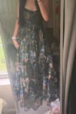 It fits like a glove. So cute and versatile. I bought this dress specifically to cater to both spring and fall weddings so I am excited that it worked out great! - Marina R.