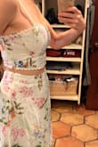 This is a super cute 2-piece; however, the top is designed in such a way that it actually flattens the bust area, rather than supporting the bust area. It gives the bust a flattening appearance versus a lifting appearance. I am a 34B, and my bust is fairly perky, and this top flattens my bust area. That being said, I still think it's a beautiful, well-made two piece set and I'm gonna keep it. - Melissa B.