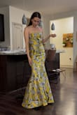 I absolutely LOVE this dress, and I think it's extremely flattering. I'm 5'5, 115 lbs, flat chested with a bigger butt, and it hugs my body perfectly. It's longer in the back, which is really pretty. - Kady B.