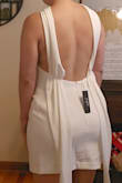 The quality was good. I loved the back details. The bust was a little large for me, and the bottom just rode up too much when I walked. I don't want to have to apply tape each time I want to wear it - Jessie L.