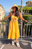 Perfect for a day in Sorrento, Italy! The small was right around the bust. The medium was big, but thankfully the tie around the bust was adjustable, so I could tighten it enough. It stayed in place to make me feel secure all day. - Felisha B.