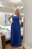 I'm obsessed with this dress. Tried it on without bra and it fit perfectly. I'm in size 12 jeans if that helps. - Rose W.