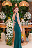 I absolutely loved this dress! It made me feel so elegant. I wore it as the bride's sister, and it was perfect for the occasion. The fabric is beautiful, very stretchy, and comfortable. The finishing details are excellent, and the overall quality exceeded my expectations. I was genuinely impressed. Definitely recommend it! - Leticia I.