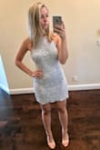 It's super cute, just a little snug because I have hips. Not sure I would size up because it would be too big, since I have a small waist size. Just be aware if you have hips or a butt like me, it will be snug! It's a fitted dress, so to be expected :) - Victoria C.