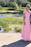 I got a lot of compliments on the dress. It was easy to put on. The pink color is really pretty. I am really happy with the dress!! - Lidia D.