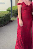 I had gotten so many compliments on this dress!!! I wore it to a military ball, and everyone loved it. I did not alter it in this picture. The dress was quite long on me even with heels, but it was as still very pretty. - Braylee C.