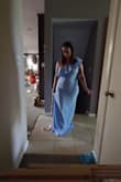 This dress was beautiful. I love the stretch material but it just did not flatter my curves. Also this is VERY long for someone that is 5ft. I'm 5ft 145lbs and it just wasn't the dress for me. - Tita W.