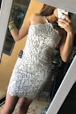 This dress is so cute! It fits true to size and is comfortable, not too tight. - Gia C.