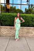 I have never felt so good in a dress. It fits so perfectly. It has a built-in slip that allows the satin dress more grace, resting on my imperfections. The color was stunning, much brighter than the photo. Love this dress! - Sarah P.