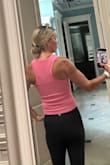 I absolutely love the look and feel of this ribbed tank! I love it so much that I am ordering it in all the colors that are available. I really like the length of it too. It's perfect! Not too long or too short. I like the hem it has by the waist too. You could tuck some of the front in, tuck it all in or just wear it shown in the pictures I've attached. Oh and it washes great!! - Wendy R.