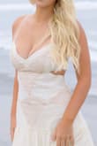 Got this for my 18th birthday pictures, it was so perfect for the beach. Super flowy and flattering. However, it was a bit loose on the sides and the boobs, so I needed to use some fashion tape. Definitely recommend buying some incase. Still looked great. I'm larger chested but the xs still fit well. It would look great with a little beige bralette under if you're worried about showing too much skin. - Valerie P.