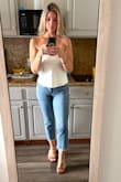 Fit true to size. Wish the open back scooped lower, but overall love the tube top! - Kendall C.