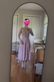 The dress is so soft and flows amazingly. It hugs my body - the top part is snug though. Not so tight that I can't sit or breathe, just enough that it is tight so it looks like it's snatched. My under bust is about 30" and 25" waist. The back is stretchy, so I'm sure it can give or take a few inches. I got 2 colors to try and decided to keep both. - Feipu S.
