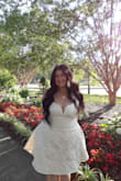 I wore this for my engagement photo shoot. This dress fits true to size. It was super flattering and I loved the halter top. :) - Hannah W.