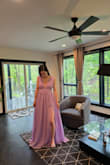 Beautiful dress! XXS was slightly too tight around the rib cage, and XS was a tad loose, but not an uncomfortable loose. Had the shoulders sewn so that they would not slip if not positioned straight upright the whole time. The dress is also long, even with heels, so you have to hold it sometimes, depending on what you're doing - Jasmine Z.