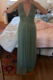 Very pretty dress, but I ended up returning because the small fits more like a medium. The straps are not adjustable enough for smaller chests (it was too big on me, and I am an B cup). It was also pretty long (I'm 5'7 and I would've had to wear at least 4 inch heels for it not to drag on the floor) and a little big on the waist. Very comfortable but runs big. - Anna A.