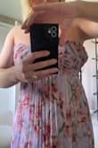 This dress looks so cute in photos, but once I received it, I was incredibly disappointed by the construction. For $100, the outside fabric, as well as the liner are both sheer. The bust area being strapless should have some type of structure, but has none whatsoever, not even a bra cup, just a rubber banding on the top that flips out once you start moving. The top fabric in the bust seemed to have an access amount and stuck out on the one side, like it needed additional stitching to keep close to the body. - Francine S.