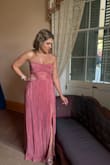 This was a great purchase! The dress does run long, and you need a strapless bra so you don't keep pulling it up. Otherwise, it's very comfortable and very flattering. - Catalina N.