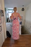 The fabric is nice and heavy, almost stiff, so the slit doesn't blow open, and it's very flattering. The top needed adjusting on me, but my seamstress found the fabric easy to work with - we shortened the straps and moved them in from the edge to prevent gaping. - Gemma N.