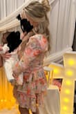 Wore this dress for my daughter's christening - got so many nice compliments on it! Very nice material, kind of has a shine to it but not too shiny it's a pretty touch. Very light material considering its long sleeves. - Stephanie P.
