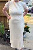 I loved this dress on the model, but the fabric felt cheap and thin. The seams weren't straight, so it looked lumpy down the sides. Also, the sleeves were very tight and uncomfortable around the cuff. - Jewel S.