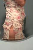 I was so excited when this arrived. I tried it on and got very disappointed with the slit. It was placed on the wrong spot, more towards the back and so high that it shows butt. I wish that I could exchange or return $59. - Samira D.