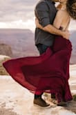 I chose this dress for my engagement photoshoot at the Grand Canyon and it did NOT disappoint! It flowed in the wind beautifully, it's lightweight, and the straps are adjustable. However, it was cold at the Grand Canyon... so make sure you get some pasties to cover up the girls! It was long on me but I didn't want it to be hemmed for this shoot. I got so many compliments on it too! - Alex V.