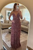 I love this dress so much. Only thing is that the straps rubbed on my shoulders, so that left a little bit of a mark. But didn't feel it rub at all! 
I got so many compliments on this dress! - Madelynn G.
