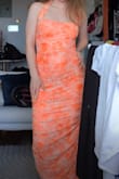 I love this dress so much!!! It's more neon than the picture but I actually personally like that better! Because it was more neon I eventually went with another dress for a wedding I was attending but I loved it so much I'm ready to wear it to a beach, vacay or summer night out!! It fit really nicely and very comfortable:) - Hannah J.