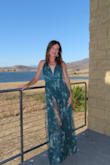 This dress was stunning - I loved the fit, color, and style. The dress is long, but that's what I wanted. 5'10 and it went all the way to the ground with 4" heels. The adjustable straps helped keep it in place (flat chested)- but you could use dress tape if you're worried. The bottom twirled beautifully on the dance floor (while dancing with dad) and showed the perfect amount of leg when walking & or strutting because I felt so great in the dress. Loads of compliments! The dress was perfect for a summer outdoor wedding. Comfy and sexy all night. - Elizabeth I.