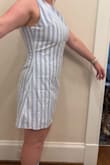 I'm typically between a large and XL in lulus, and the XL for this dress fit great. There is no stretch, so if you are between sizes, size up. My body type is fairly boxy, so it was nice to have a cute stripe for summer nights. It was a good length as well! Flirty but not butt-bearing! - Kylie H.