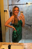I wore this to the finals of the Miss Oklahoma pageant (my daughter was a Star). I got a lot of compliments on the dress. The pattern and the sparkles were beautiful. The color is a rich emerald green. It's definitely short, but I didn't feel like it was too short. I do wish the loops on the back were stronger. I struggled to tighten the dress myself because I worried they'd rip. When I had someone help me, they, too, thought the loops might rip. So we had to be extra delicate when tightening the straps. BUT I did love that the straps were adjustable with the back "corset" tying. It made the dress feel more adjustable and secure. - Meredith W.