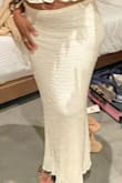 I thought the skirt ran a bit big but it's great for a low waisted fit. I thought it was going to be see through and I ended up wearing nude underwear with it, but it was not. Great price as well! - Krista T.