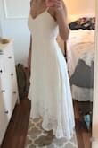 Beautiful dress! It fit perfectly. The material was heavier than I expected it to be, but it's not too warm or stuffy. Definitely a perfect summer dress. - Emma V.