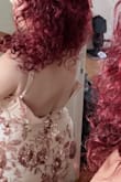 The zipper gets stuck when I pull it up and down. Takes forever to take off and on. I'm afraid it's going to break. I'm wearing it in Oct. I'm planning to lose weight by then. - Francisca B.