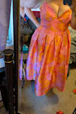 I love this dress, but the top is just not stitched right. Maybe smaller boobs would be better, but I don't think mine are that big. I want bigger lol. Something with the straps and seams in the bust area just doesn't look right no matter what bra I tried. Also, the plastic zipper bag had the threat of the dress sticking in it, so there was a large pull all the way across the front of the skirt. I was able to smooth it pretty well but still disappointed. - Beth C.