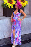 Wore this dress to a polo match in Newport, RI. It was a perfect fit! The fabric is heavy, but I didn't feel too hot in it as it flows when you walk. 
I wore 4 wedges, otherwise I would have had to take it in a few inches. Shows somewhat a lot of cleavage, so if you don't like that, I'd suggest wearing a cami or something underneath. I opted for silicone covers.
I had so many people compliment me in this dress! I enjoyed wearing it! - Stephanie L.