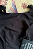 This sleeveless bodysuit with an open back would be great, but unfortunately it is very poorly sewn. The left and right sides of the chest are not the same, as if there is more fabric, so in this case I can't even resell it. I am very disappointed. This is the first time I have had a problem with Lulus. - Martina M.