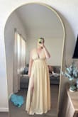 The dress is beautiful, it was a tad long, but with heels on, it's the perfect length! - Taylor L.
