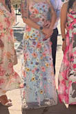 I am absolutely in love with this dress. It's as beautiful as it appears in the picture and just as comfortable to wear. Great quality! I received so many compliments. I ordered a large so I could bring it to a seamstress to have it fitted. It didn't feel heavy. I cannot wait to wear it again! - Michelle N.