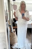 I love this dress! It fit with no room for a full tummy after eating reception meal/wedding cake. I think I'll be more comfortable in the next size up (L). It's a garden wedding in July so I need to be able to move! - Annie B.