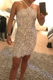I got this dress for my graduation and loved how it fit and felt on. The material isn't too thick and it hugs nicely without inhibiting movement. Very happy with my choice! - Nadia R.