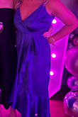 I felt absolutely beautiful in this dress.  A few things, I'm a little big on the rib cage size so I went with a large, I am usually a size 8-10. It was a little roomy in the bust, I had to pin it. I also had to have someone tack down the ruffle about mid-thigh as it could potentially slide all the way open, small minor adjustments. Beautiful quality and color. Took me a while to steam it - don't wait until the last minute :) 
Plan on wearing again for a late summer wedding.
Gorgeous- great quality and very flattering. - Jenn H.